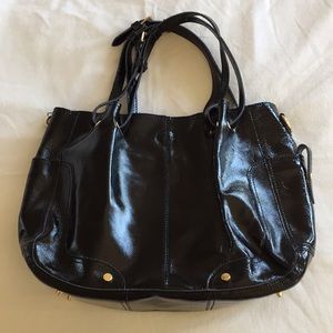 Black patent handbag